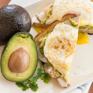 Avocado toast is the ultimate healthy breakfast recipe that's so incredibly easy. Layer turkey, a fried egg, and a big scoop of avocado! It is wholesome and delicious.