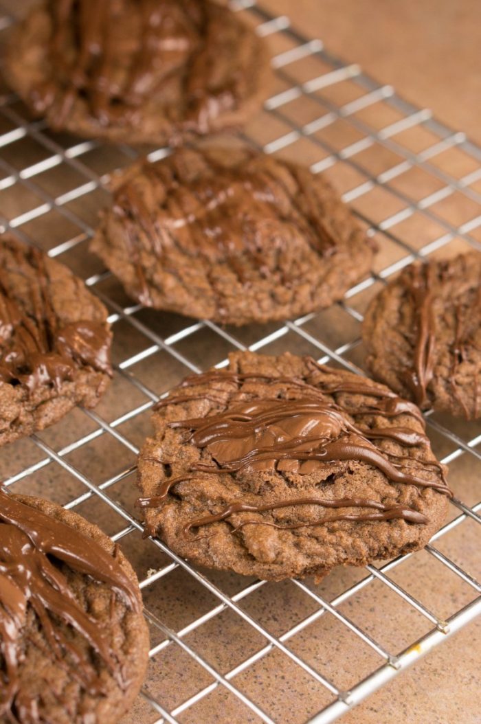 A bite of perfection in these Triple Chocolate Nutella Cookies. They are soft, chewy, creamy, chocolate overload cookies is a favorite treat dessert recipe..