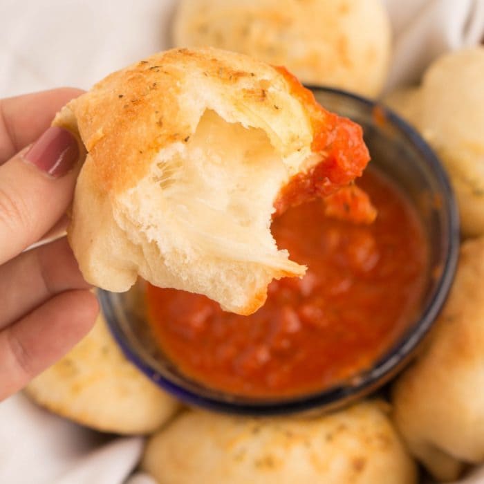 Your favorite garlic knots are all rolls up into these yummy Italian Cheese Rolls. So easy to make and delicious side to your pizza or pasta dinner. 