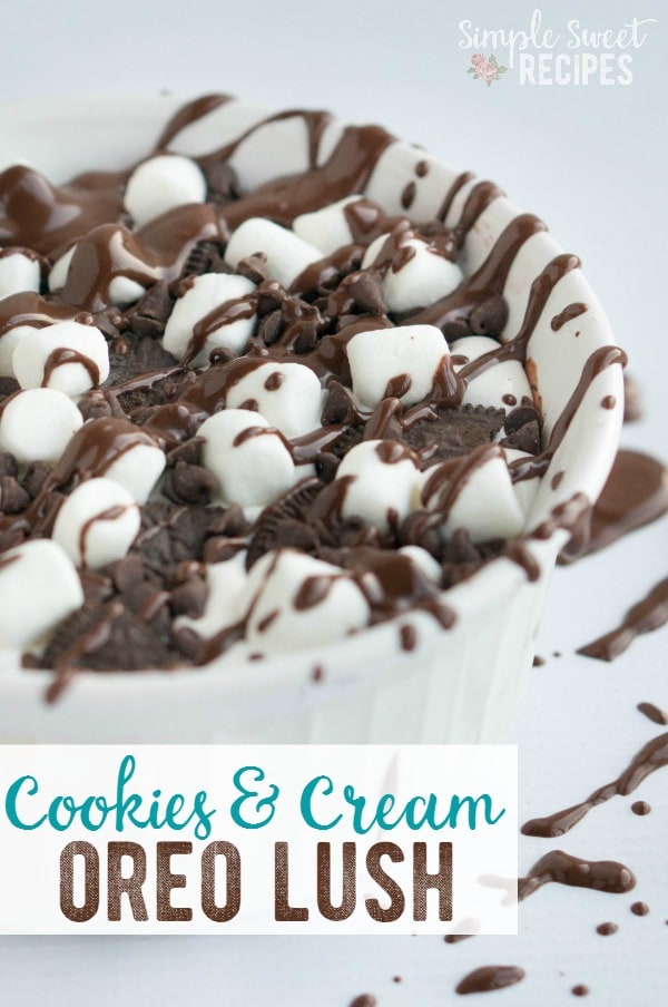 Oreos, chocolate, and marshmallows combine in this amazing Cookies n' Cream Oreo Lush dessert. Layers of yummy flavor in each bite. It all starts with an Oreo crust and then add a cream cheese layer, chocolate pudding, and marshmallow fluff with whip cream topping. 