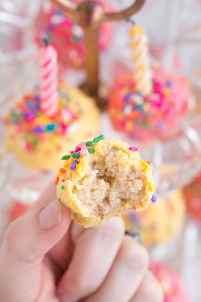 Confetti cake and sprinkles combine for these moist, delicious Sprinkle Birthday Cake Balls. A traditional birthday cake made easier to serve - grab a bite and go! Add candles for a miniature birthday cake!