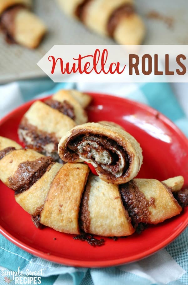 Easy 4-ingredient nutella rolls. This fun dessert / treat recipe can be prepared in just a few minutes and the warm flakey layers will taste heavenly. #Nutella #Dessert #DessertRecipes #NutellaRolls