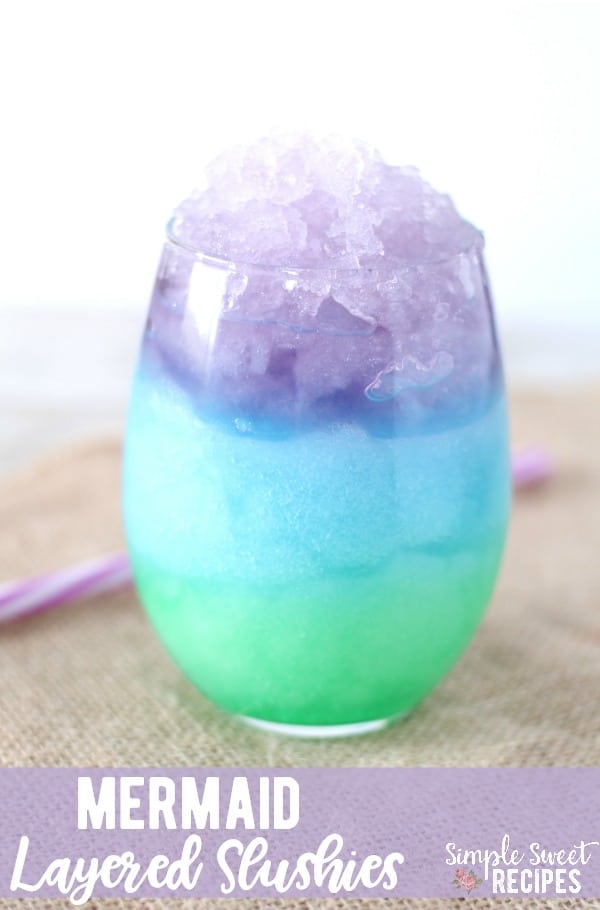 This fun and colorful (and so easy) Mermaid Layered Slushies recipe is just begging to be enjoyed! The perfect summer treat with just a few simple ingredients.