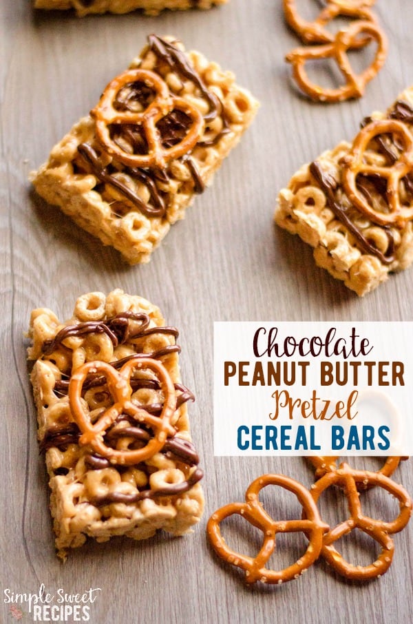 Homemade, no-bake, so easy cereal bars! These are loaded with cheerios, marshmallow, and peanut butter and topped with chocolate and pretzels. The perfect combination of sweet and salty with lots of protein to keep you feeling full longer. A fun breakfast on the go option or after school snack / treat. #cereal #breakfastbars #cerealbars #cheerios #pretzelbars #dessert #snacks #afterschoolsnacks #marshmallows #chocolate